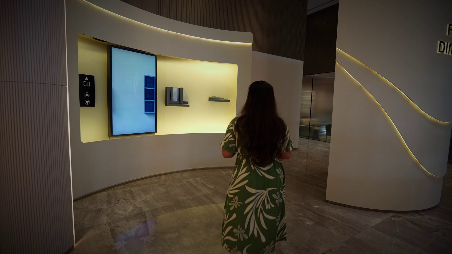 curved experiential display showing construction materials through guided digital storytelling